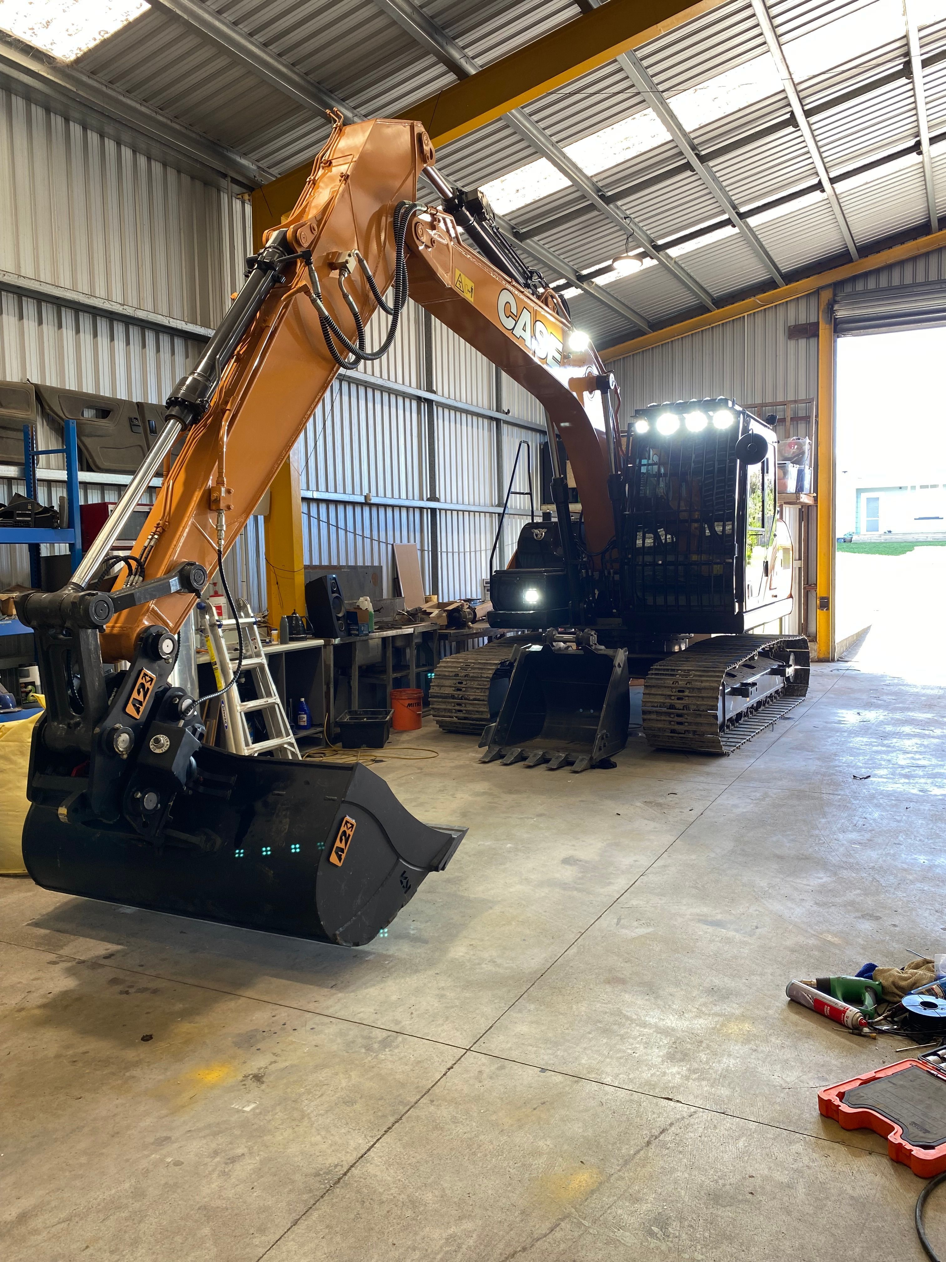 CAT excavator LED work lights installation farm machinery electrical Whanganui